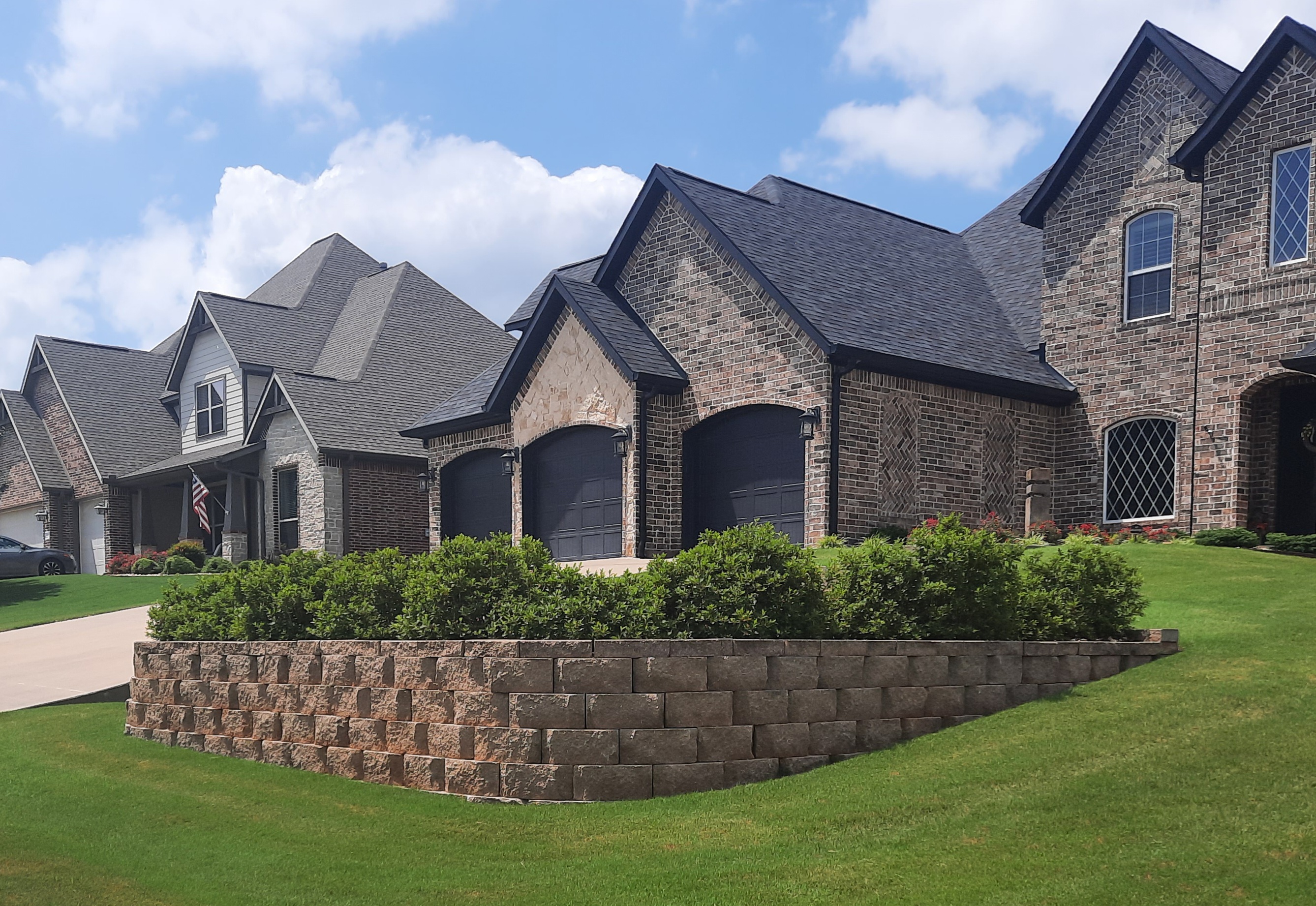Residential retaining wall by Unlimited Outdoors in Centerton, AR